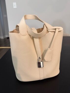 Cream Faux Leather Bucket Bag with Silver Lock